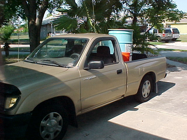 Yota with heavy barrel of lead wheel weights for cleanup.jpg